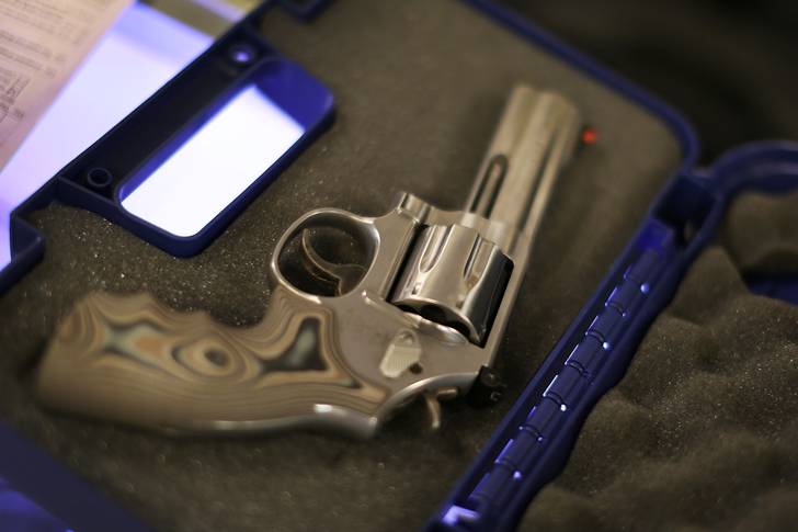 A handgun in its case.